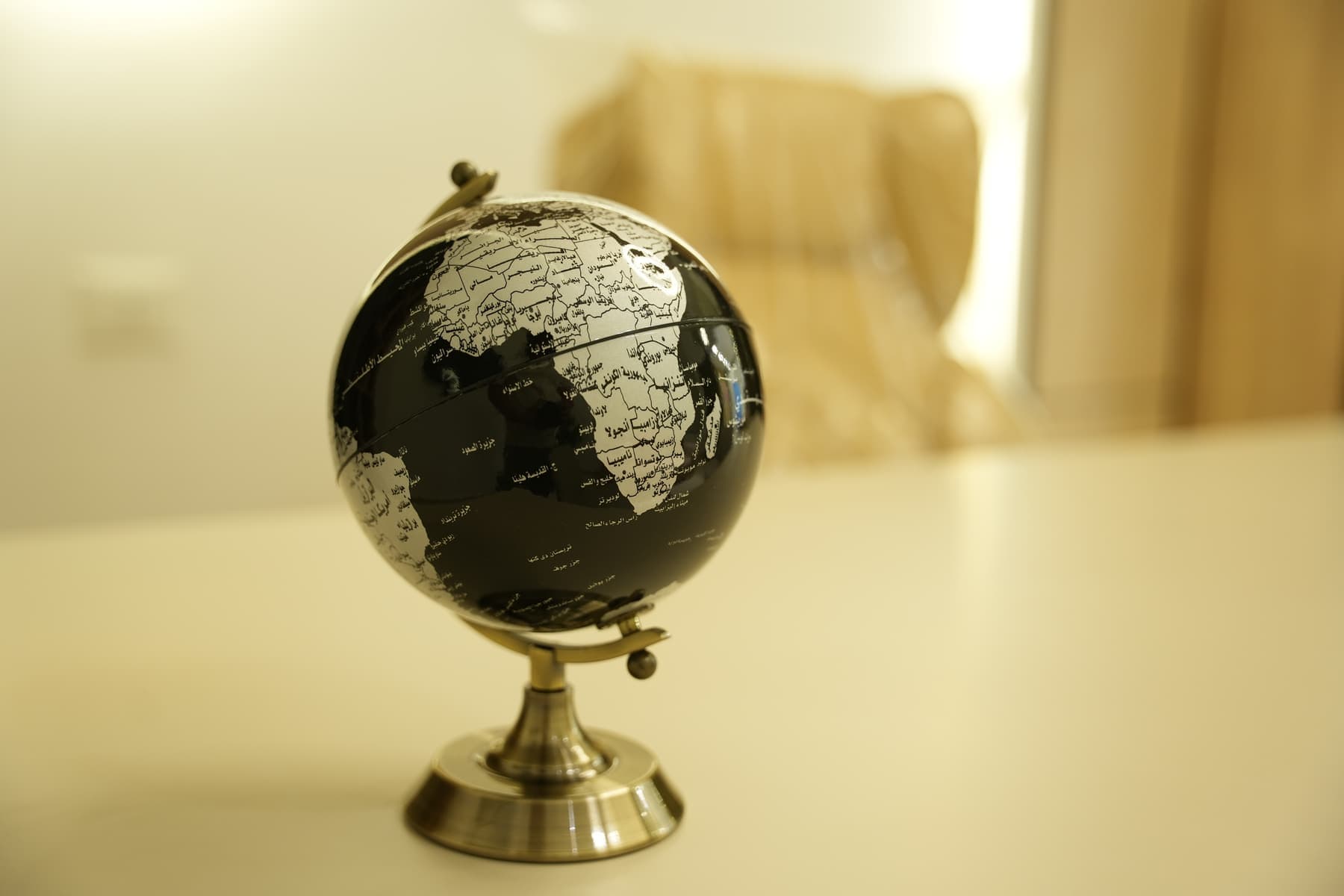 A desk globe in one of the school offices